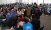 Flüchtlinge aus Syrien bei der UNHCR-Registrierung im Libanon